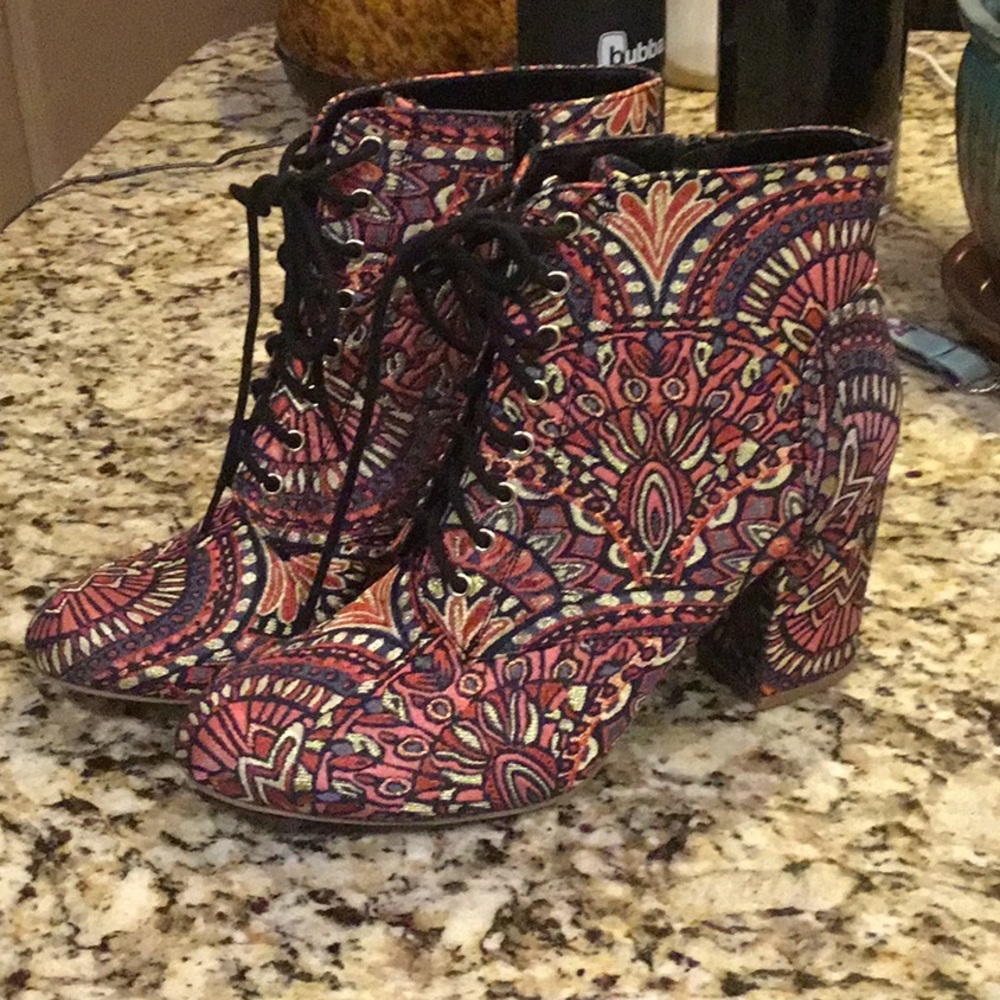 Exotic unusual brand new lace up fabric heeled boots
